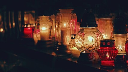Cemetery Grave Tombstone Decorated with Candle Lanterns on All Saints Day Evening