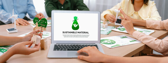 Sustainable material illustration displayed on laptop during green business meeting. ESG...