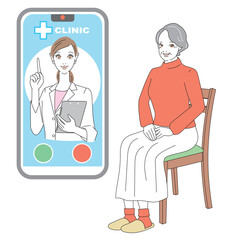 スマートフォンでオンライン診療を受けるシニア女性