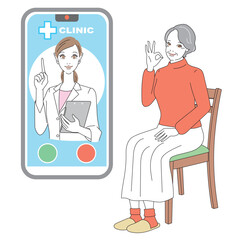 スマートフォンでオンライン診療を受けるシニア女性