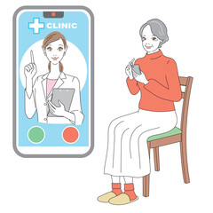 スマートフォンでオンライン診療を受けるシニア女性