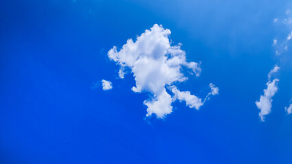 Fototapeta na wymiar Blue with white clouds. Beautiful photo of heaven in high quality. Stock image of clouds.