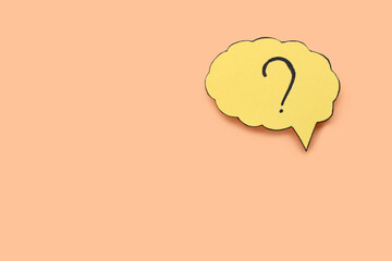 Paper speech bubble with question mark on beige background, top view. Space for text