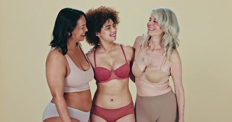 Body positive, diversity and women hug, smile and happy for self love, natural beauty or inclusivity. Woman empowerment, group inclusion and support friends in lingerie underwear on studio background
