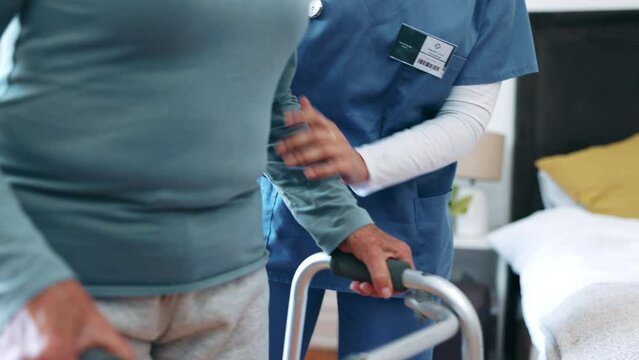 Physiotherapist, woman and walking frame with help for exercise, wellness and recovery in nursing home. Caregiver, doctor and person with disability with rehabilitation, steps and support in house