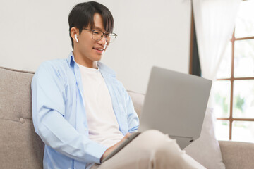 Business lifestyle, Businessman wears bluetooth headphones to meeting and chatting on video call
