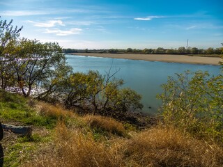 the Kuban River in its lower reaches near the city of Krasnodar (South of Russia) - landscape on a sunny day at the end of November