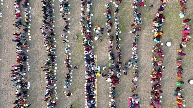 Aerial view of Majlis, Uros, public food offering festival in Bangladesh.