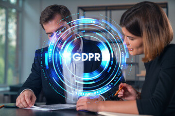 Businesspeople in formal wear taking notes signing contract at office workplace. Concept of important working moments, document sign, working process, concentration. GDPR hologram
