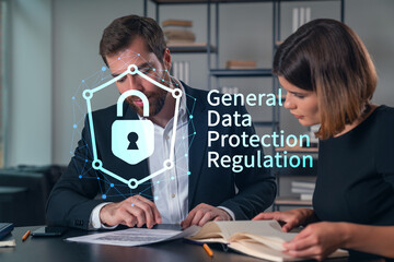 Businesspeople in formal wear taking notes signing contract at office workplace. Concept of important working moments, document sign, working process, concentration. GDPR hologram