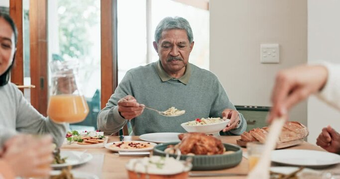 Senior man, family and talking while eating food in house for social gathering lunch, holiday and celebration dining. Smile, group or happy elderly person with healthy meal in home for dinner hosting