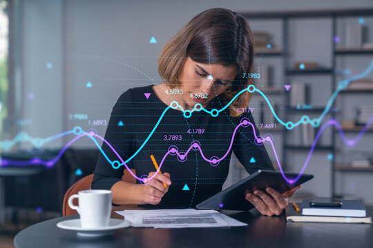 Businesswoman holding tablet device, touching screen. Office workplace. Concept of forex home trading, distant work, stock market, chart and graph, information technology.