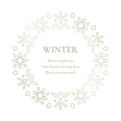 Fototapeta na wymiar 素材_フレーム_雪の結晶と光をモチーフにした冬の飾り枠。金色の高級感のある囲みのデザイン