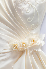 Gorgeous fabric flowers in creamy color, soft pleats of satin fabric with embroidery. Part of the...