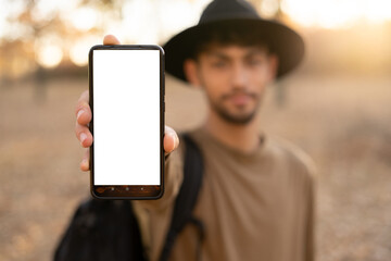 Woman holding phone with white screen mockup, gps or directions on holiday, vacation or trip. Tourist, travel and map apps - obrazy, fototapety, plakaty