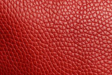 Close up light red leather texture, background.