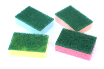 Soft cleaning sponge for washing dishes, isolated in white background. Concept, useful equipment for cleaning, scrubbing dish in kitchen or use for other purposes. Household tool.                     