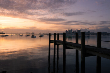 Auckland Harbour jetty sunrise.