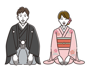 着物姿でお辞儀をする男女