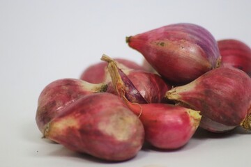 red onions on a white background