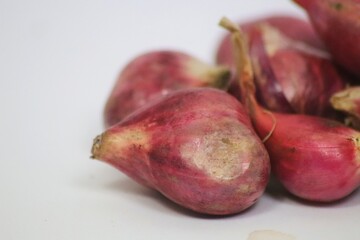 red onions on a white background