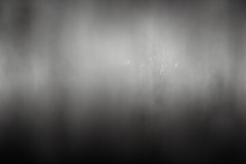 Blurry black, dark gray, silver and white color gradient. Grain, noise effect. Abstract background, banner, wide. Design. Pattern, color palette. Gradient. Spectrum. Shades of dark colors. Haze