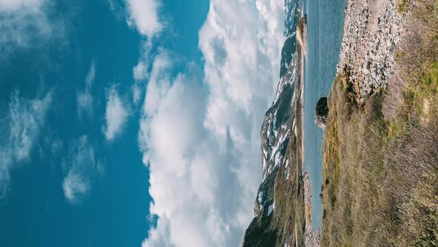 Oppland, Tyin Lake, Norway. Vertical Footage Video. Stones On Coast Of Beautiful Lake Tyin In Summer Day. Norwegian Nature.