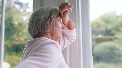 Window, thinking and senior woman or alzheimer, doubt and anxiety for future, retirement and choice. Elderly person, nursing home and depression or mental health, stress and regret decision or fear