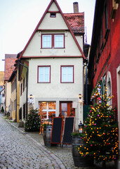 Fototapeta na wymiar Traditional architecture of Germany. Streets of Rothenburg town. Landmarks of Bavaria