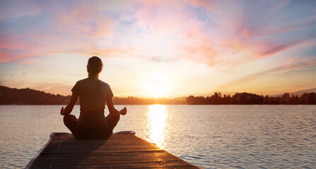 yoga, woman meditating on wooden pier near lake at sunset, meditation and mindfulness banner...