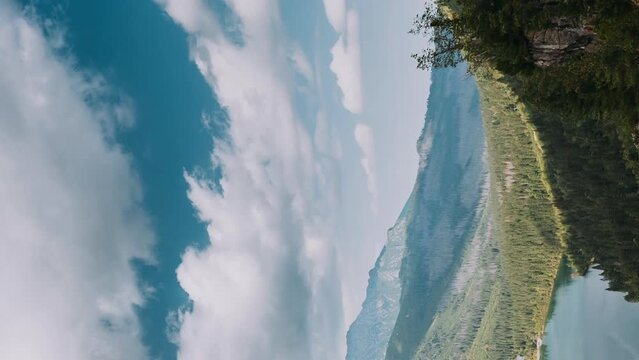 Tatra National Park, Poland. Hyperlapse. Famous Mountains Lake Morskie Oko Or Sea Eye Lake In Summer Day. Tatras Lake Landscape. UNESCO's World Network of Reserves. Polish Nature.Vertical Footage.