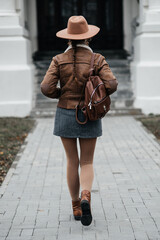 Girl walking to the estate in modern style