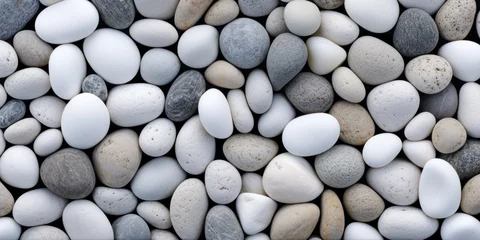 Fototapeten light rock, gavel, pebble stone texture pattern for background. © LeitnerR