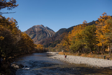 Fototapeta na wymiar Morning in Kamikochi. Kamikochi National Park in the Northern Japan Alps of Nagano Prefecture, Japan. Beautiful mountain in autumn leaf.