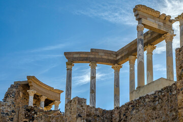 Back of the capitals, columns and cornices of the stage of the Roman theater in Mérida, with the...