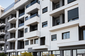 Apartments. Buildings facade exterior with windows, palm trees, real estate property architecture