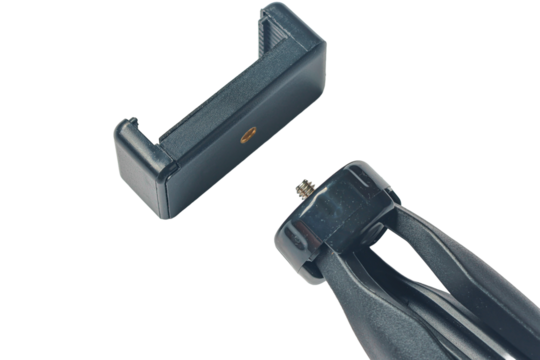 Mini tripod with cell phone holder with bottom removed, technology concept