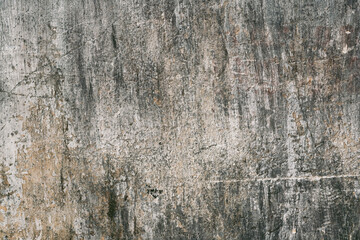 Grunge style urban weathered shabby  peeled painted concrete unique moody surface of the wall with holes, scratches and cracks macro background