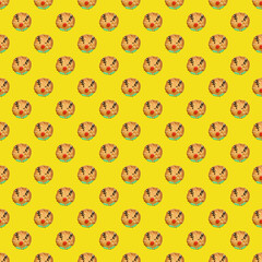 Seamless Pattern of Reindeer Shaped Christmas Cookies on Yellow Background