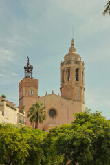Church of San Bartolome and Santa Tecla. Sitges, Barcelona, ​​Spain. The church was built in the 17th century. Its silhouette is one of the most typical images of the town of Sitges.
