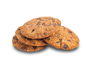 Pile of delicious homemade crispy oatmeal biscuits with chocolate chips isolated on white background with clipping path.