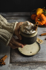 pumpkin latte with cinnamon and pumpkins