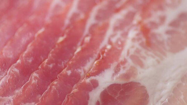 Raw smoked bacon. Streaky brisket slices, fresh thin sliced bacon.