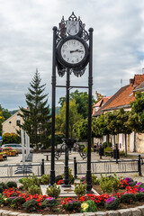 Fototapeta na wymiar Clock in front of Townhall in Bardo - small town in 