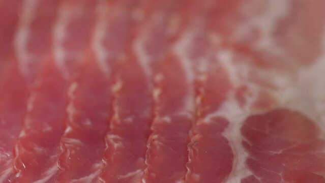 Raw smoked bacon. Streaky brisket slices, fresh thin sliced bacon.