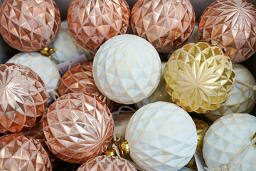 Christmas ornaments. Christmas market store - Pink and white decorations balls in the box