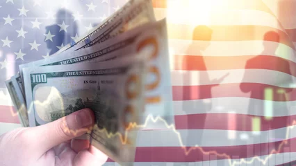 Fotobehang USA economy. Hands with money. American flag. Economic falling chart. Financial crisis. Problems in USA economy. Stock market crash. Economic collapse. USA economic crisis. © Grispb