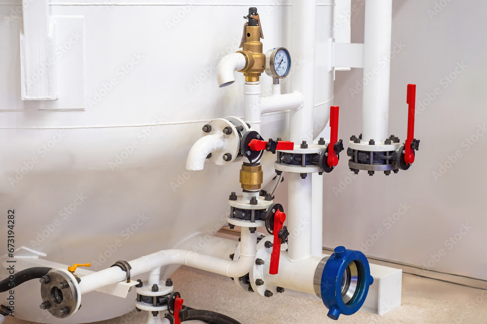 Poster heating system pipes. white pipeline with taps and manometers. boiler technologies. room with heatin