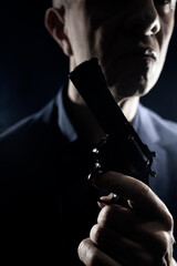 Assasin spy killer with handgun pistol