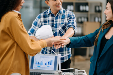  hands of business people join together their hands together on unity concept